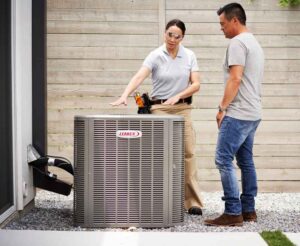 technicians installing an ac unit