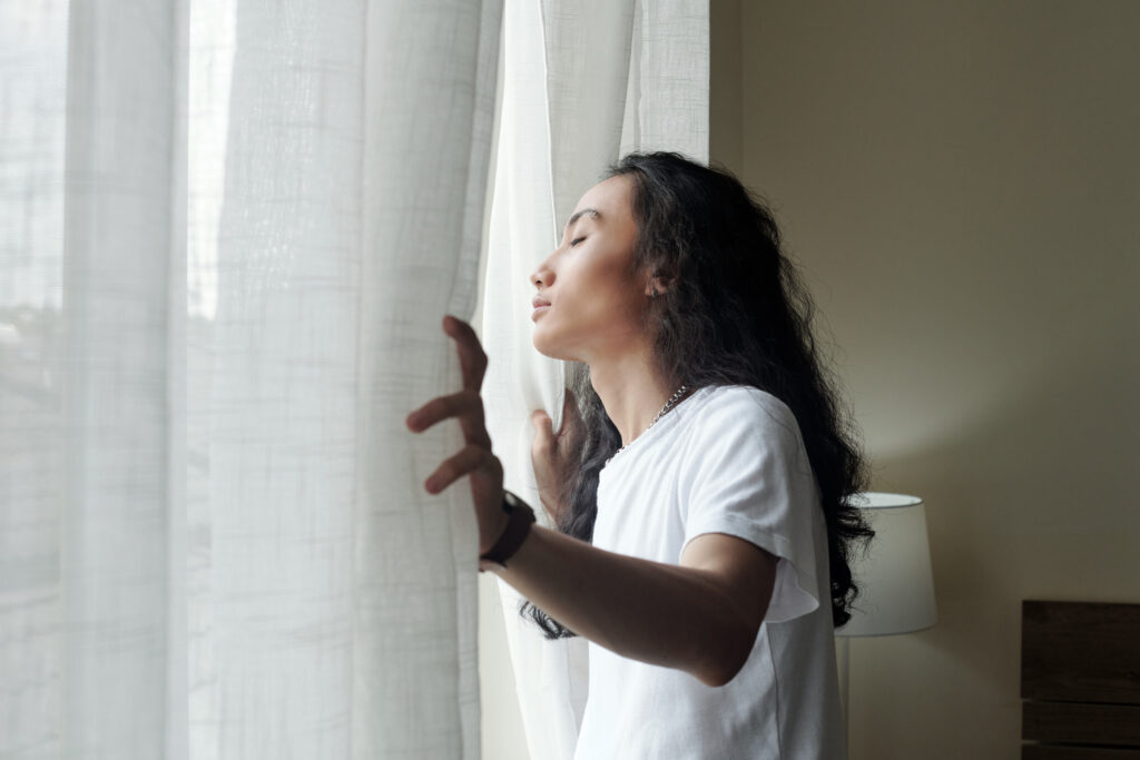 Opening windows to improve air quality inside home